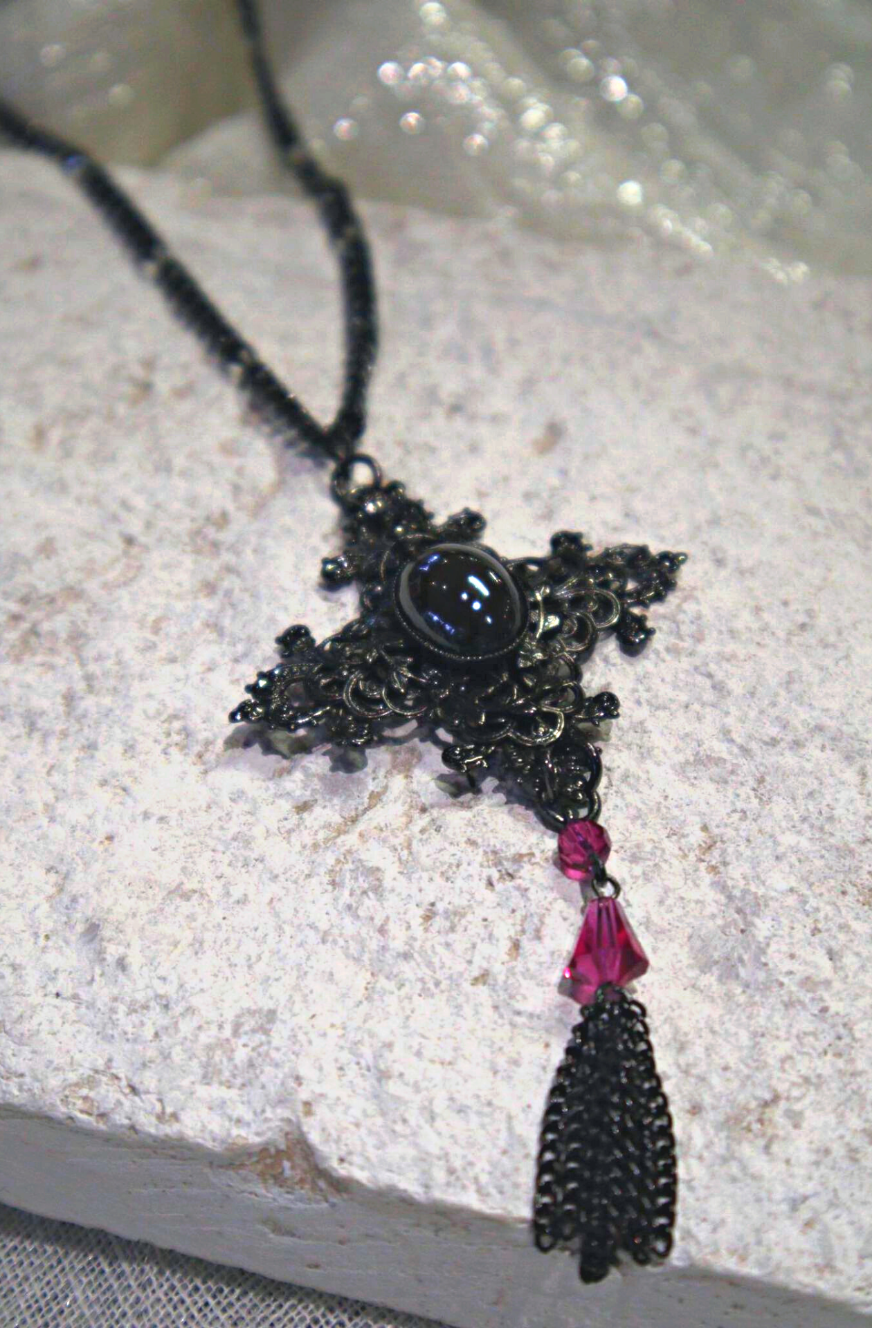 Amalfi Hematite Cross Pendant. Swarovski Fuchsia Crystal