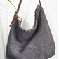 A charcoal grey shouder bag ethically handcrafted from sustainabe jute, designed in Australia.