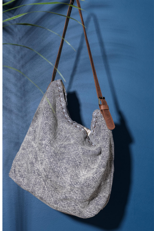 A rlight smoky grey shouder bag ethically handcrafted from sustainabe jute, designed in Australia.