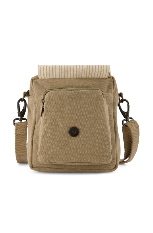 Hard wearing canvas mini crossbody bag with fully adjustable/removable  strap showing exterior pocket under front flap, with detail of striped cotton liniing visible. also visible is the magnetic closure under the front flap