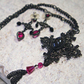 Amalfi Hematite Cross Pendant. Swarovski Fuchsia Crystal