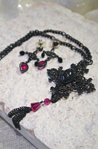 Amalfi Hematite Cross Pendant. Swarovski Fuchsia Crystal