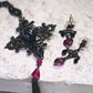 Amalfi Hematite Cross Pendant. Swarovski Fuchsia Crystal