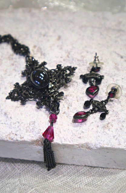 Amalfi Hematite Cross Pendant. Swarovski Fuchsia Crystal