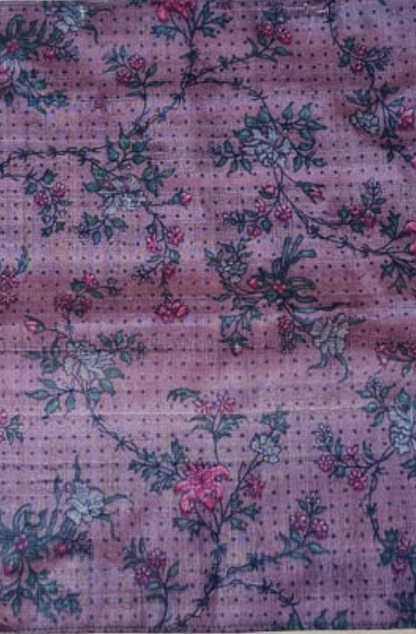 A dusty light pink with a vine type floral pattern sparsely covering the square